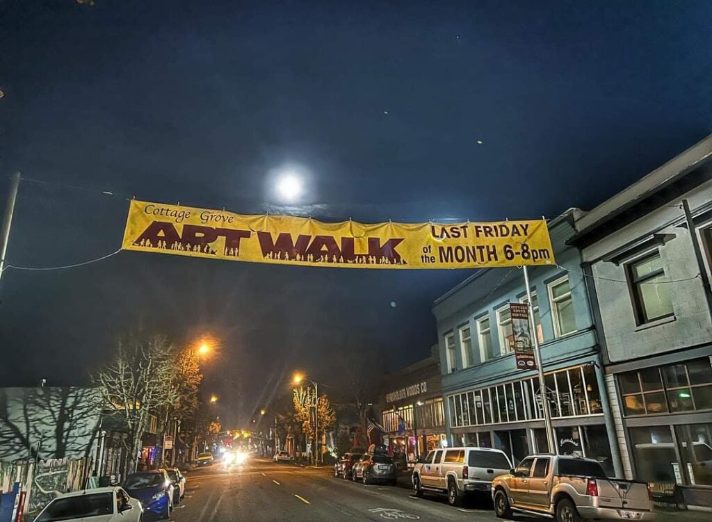 Art Walk banner across Main Street, Cottage Grove, Oregon